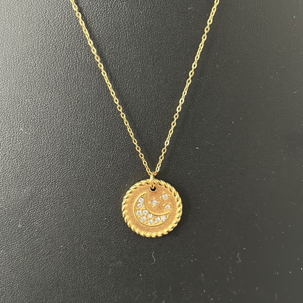 Adorina NWOT Water Resistant celestial disc pendant